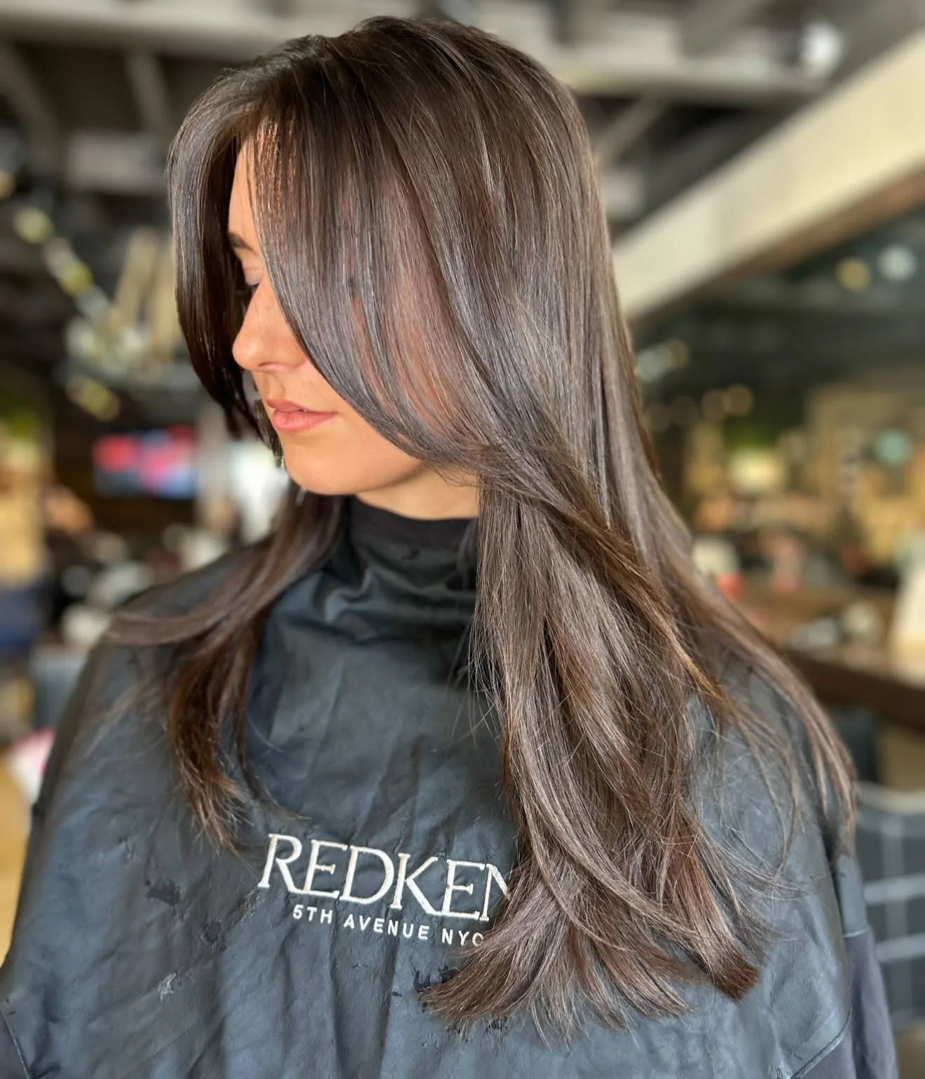 Cool brunette with fine highlights, client profile — Redken professional cape